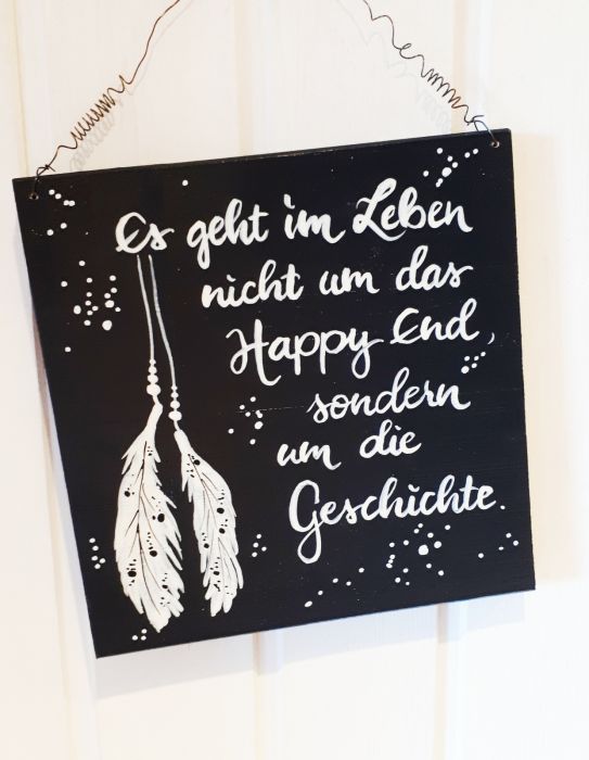 Sprücheschild "Es geht im Leben nicht um das Happy End..."